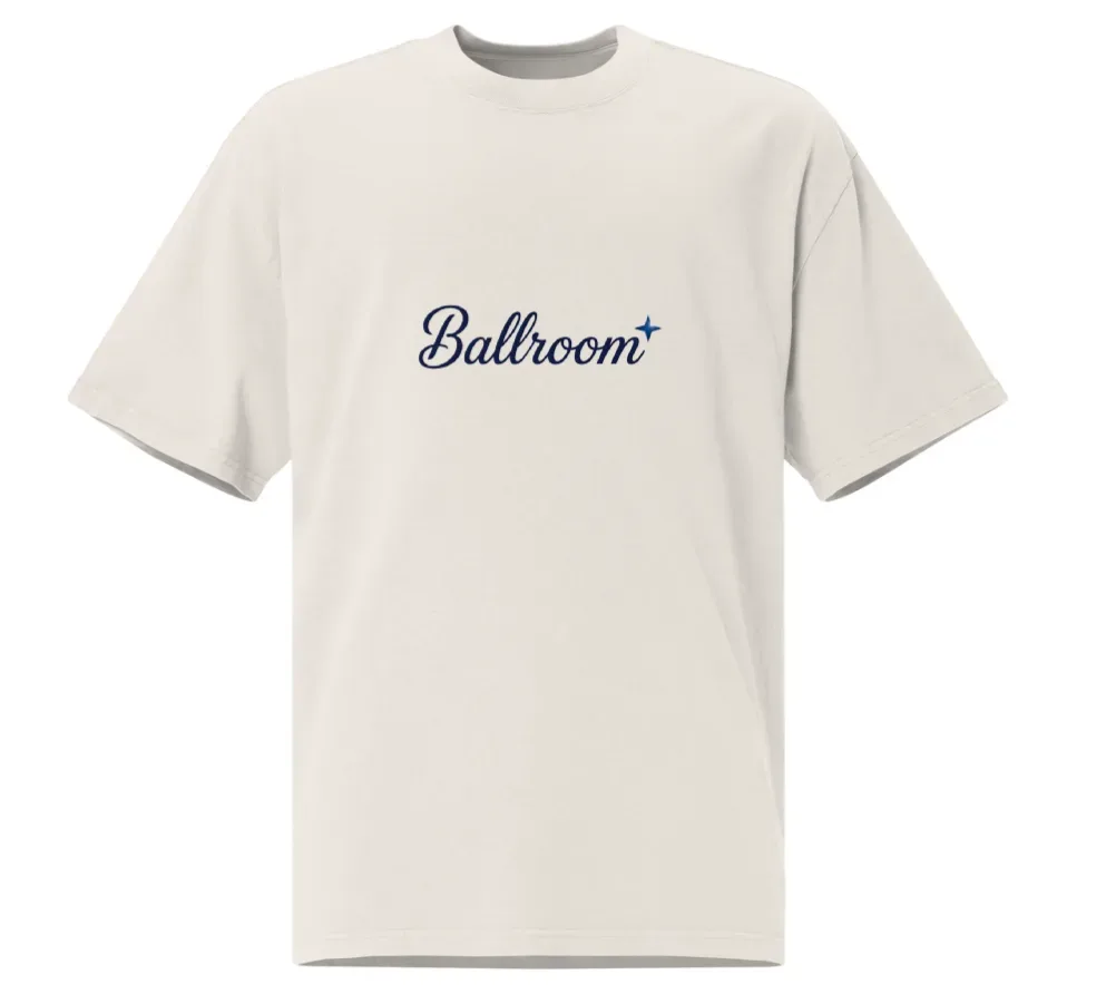 Cream oversized Ballroom tee with the navy script logo on the chest