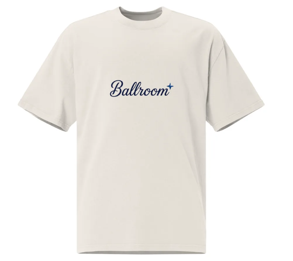 Cream oversized Ballroom tee with the navy script logo on the chest
